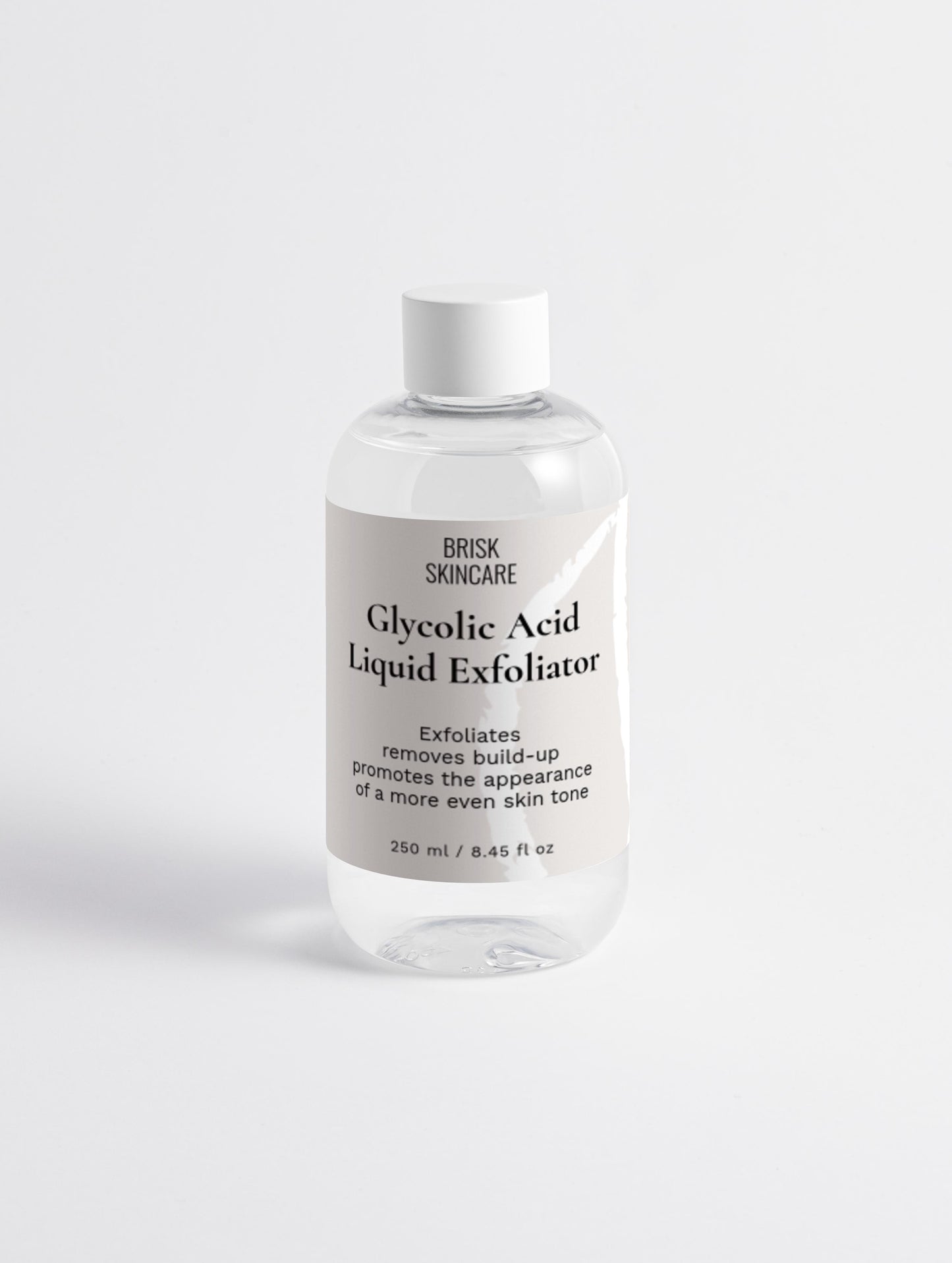 A clear plastic bottle with a white cap containing Glycolic Acid Liquid Exfoliator, labeled for skincare use.