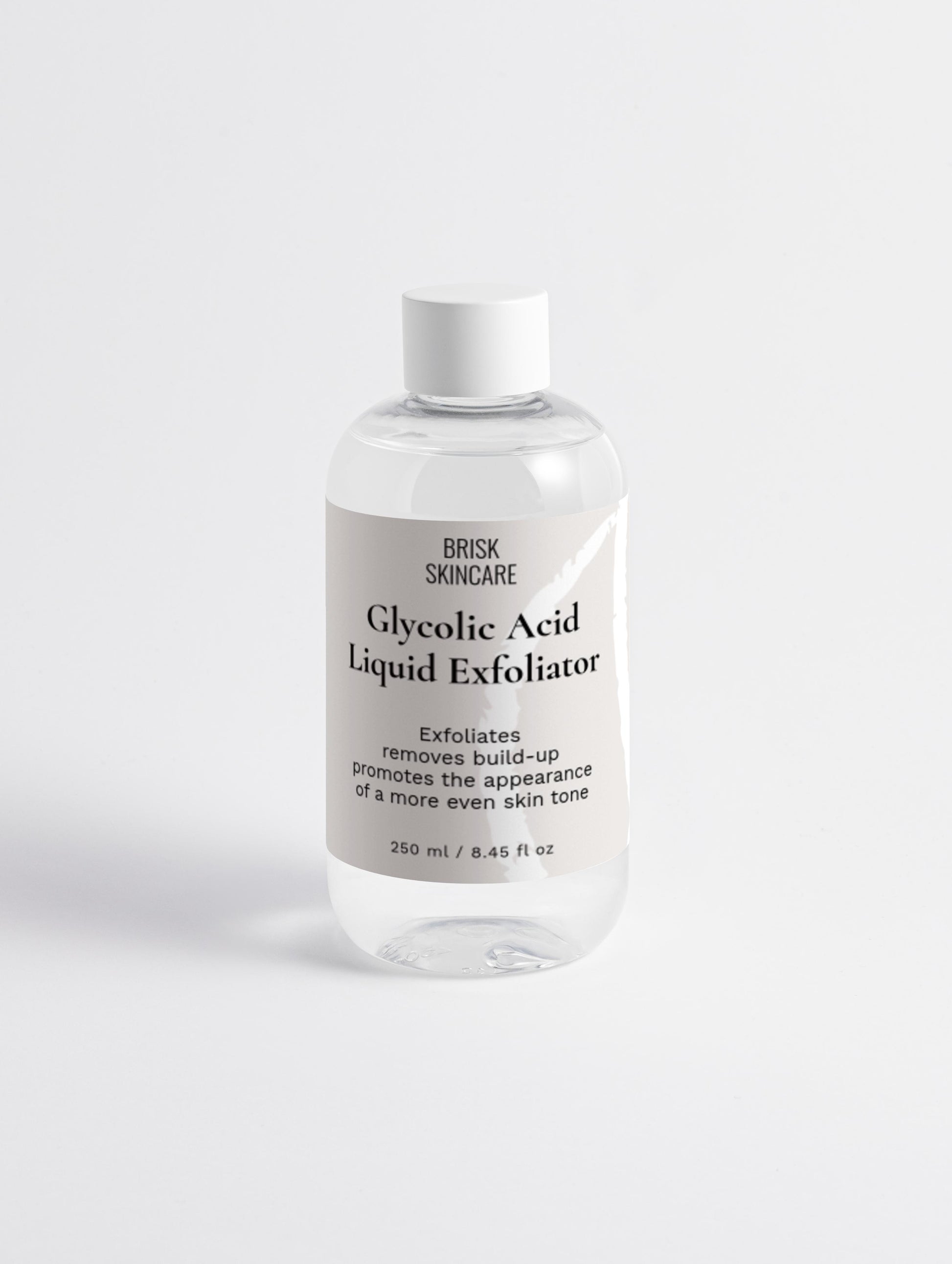 A clear plastic bottle with a white cap containing Glycolic Acid Liquid Exfoliator, labeled for skincare use.