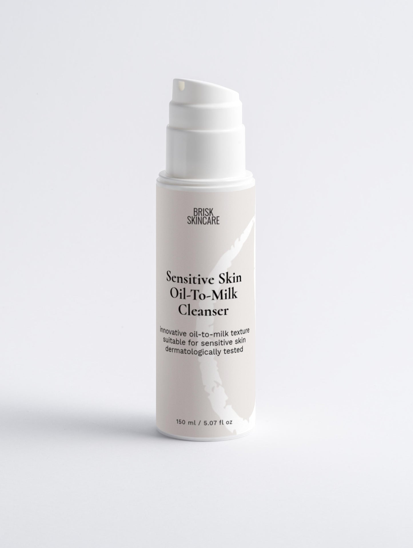 A pump bottle of Sensitive Skin Oil-To-Milk Cleanser for facial cleansing, white and clean with minimalist design.