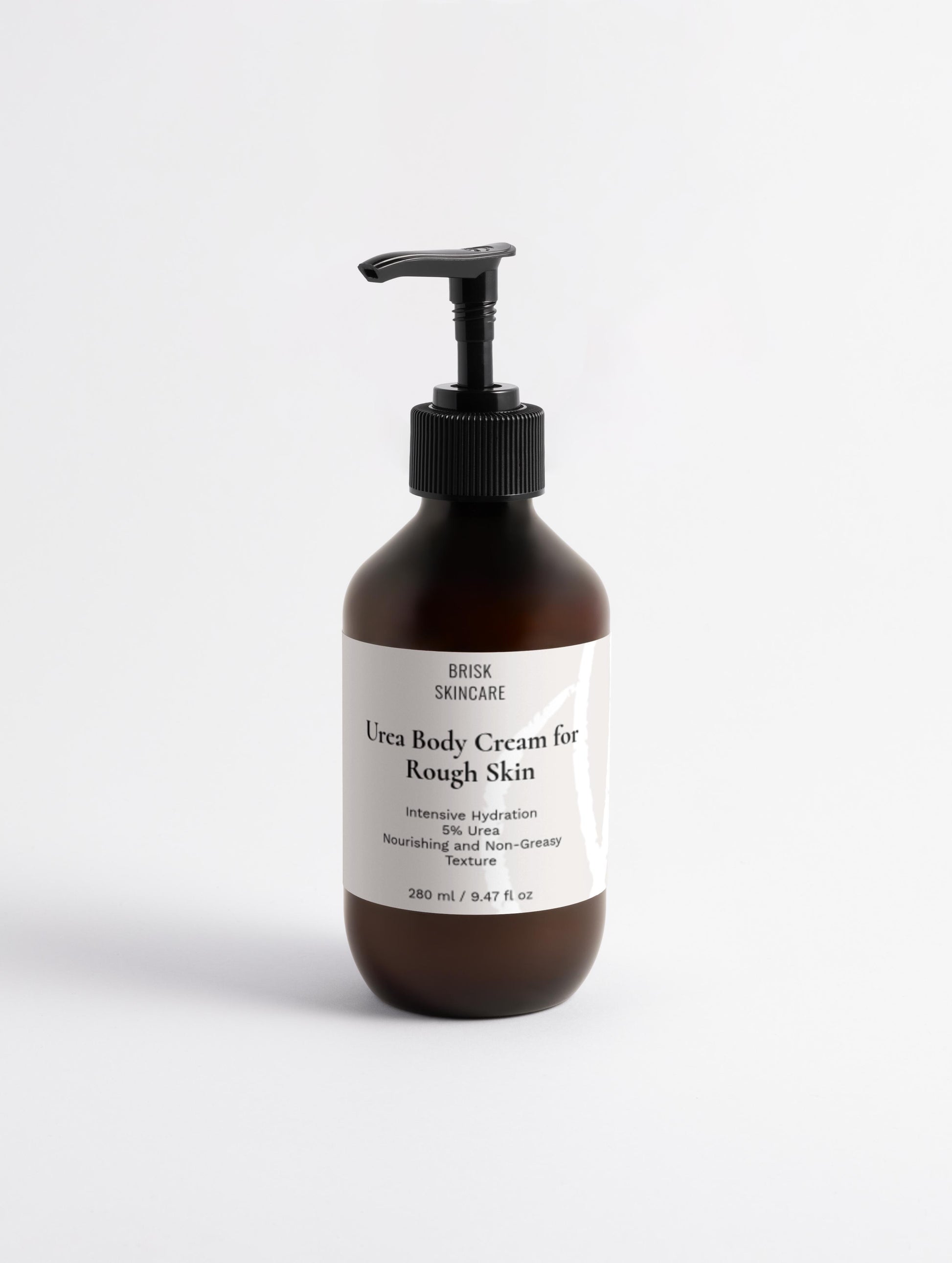 A pump bottle of Urea Body Cream for Rough Skin with a label that includes the product name and benefits.