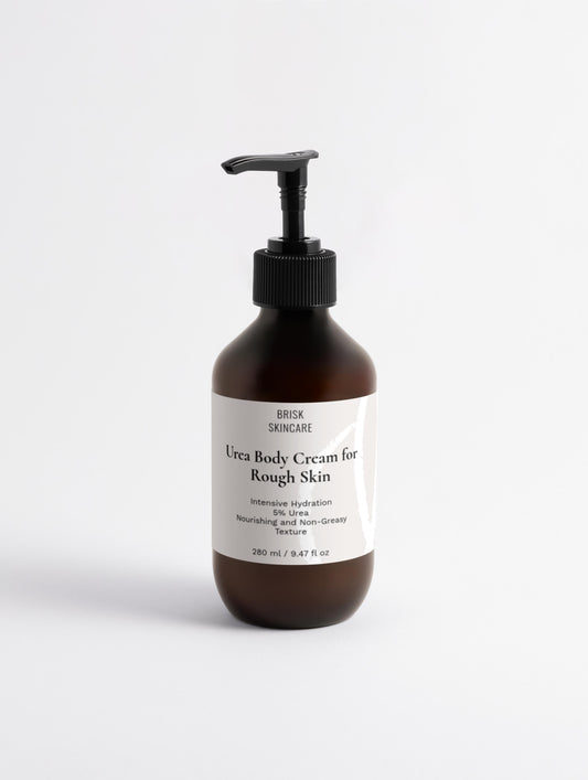 A pump bottle of Urea Body Cream for Rough Skin with a label that includes the product name and benefits.